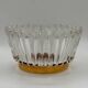 Crown coupe in ribbed glass with a brass base.