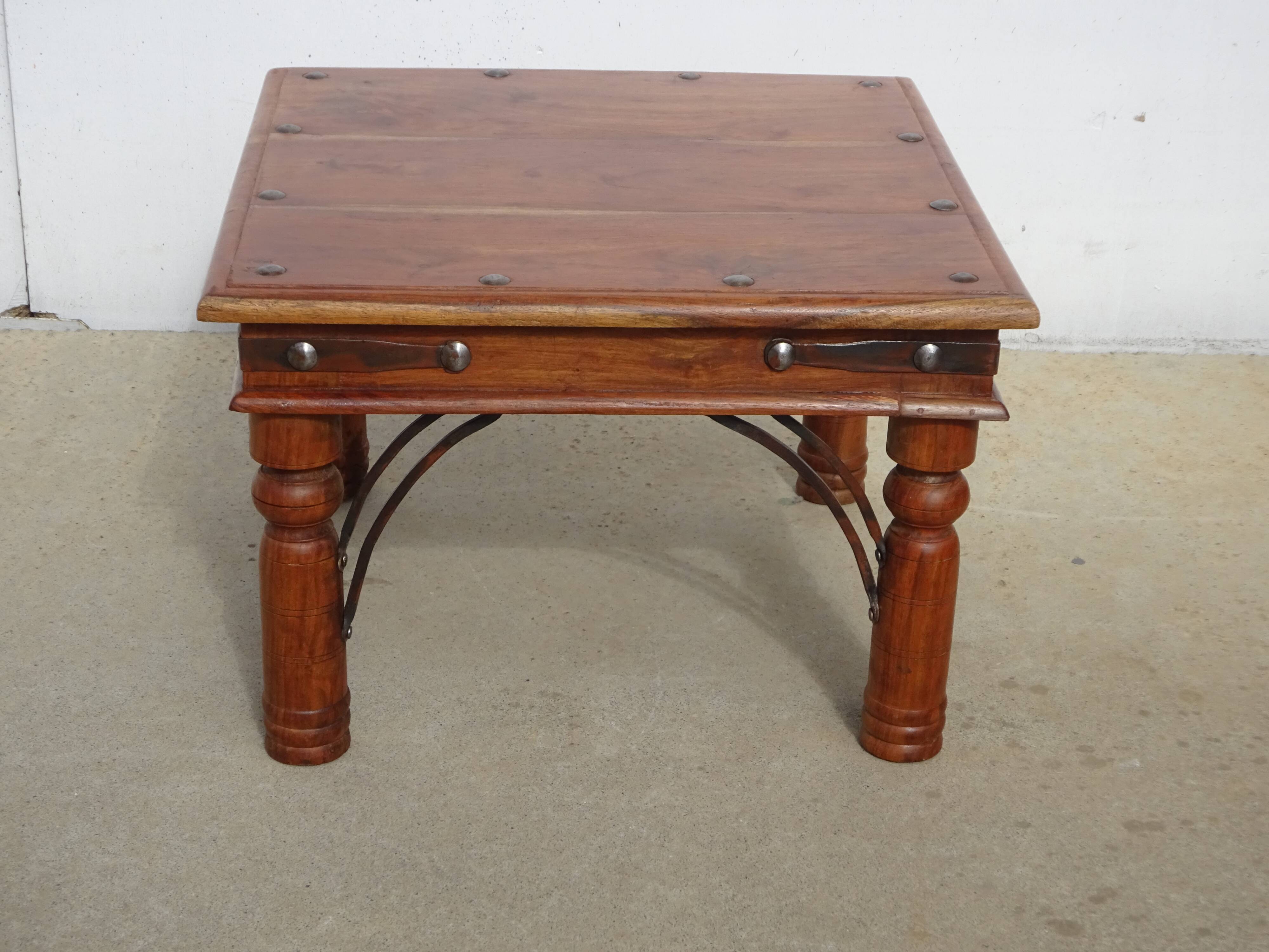 Square coffee table in exotic wood and wrought iron.