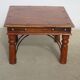 Square coffee table in exotic wood and wrought iron.