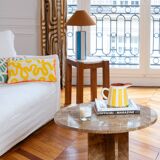 Round beige marble table