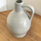 Pitcher with ceramic handle