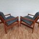 A pair of Danish armchairs, teak, wool, leather