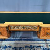 Louis XVI style marquetry desk. The top is decorated with green leather.