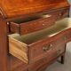 Antique drop-leaf cabinet in walnut with maple inlays, Italy, mid-18th century.