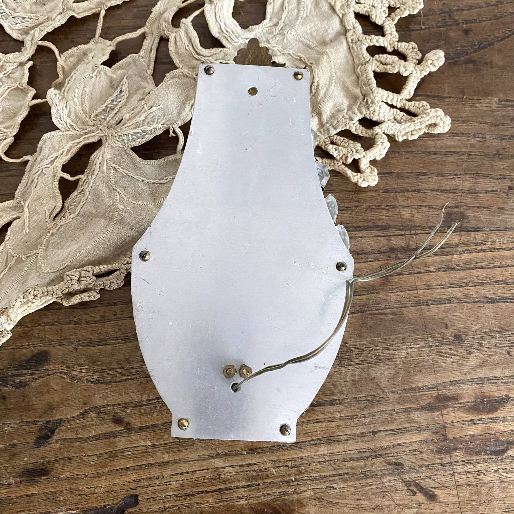 Wall light with pendants and brass hot air balloon