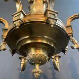 Important Louis XVI style chiseled bronze chandelier with 8 light arms by Lucien Gau