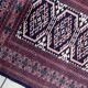 Handmade vintage 1960s Uzbek Bukhara rug – small wool tribal carpet (65cm x 95cm)