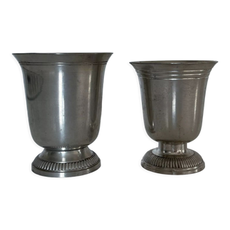 Suite of pewter timpani