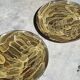 Pair of green glazed stoneware ceramic plates