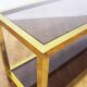 Brass console and smoked glass