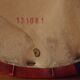 Vintage round pouf in red and black Skai