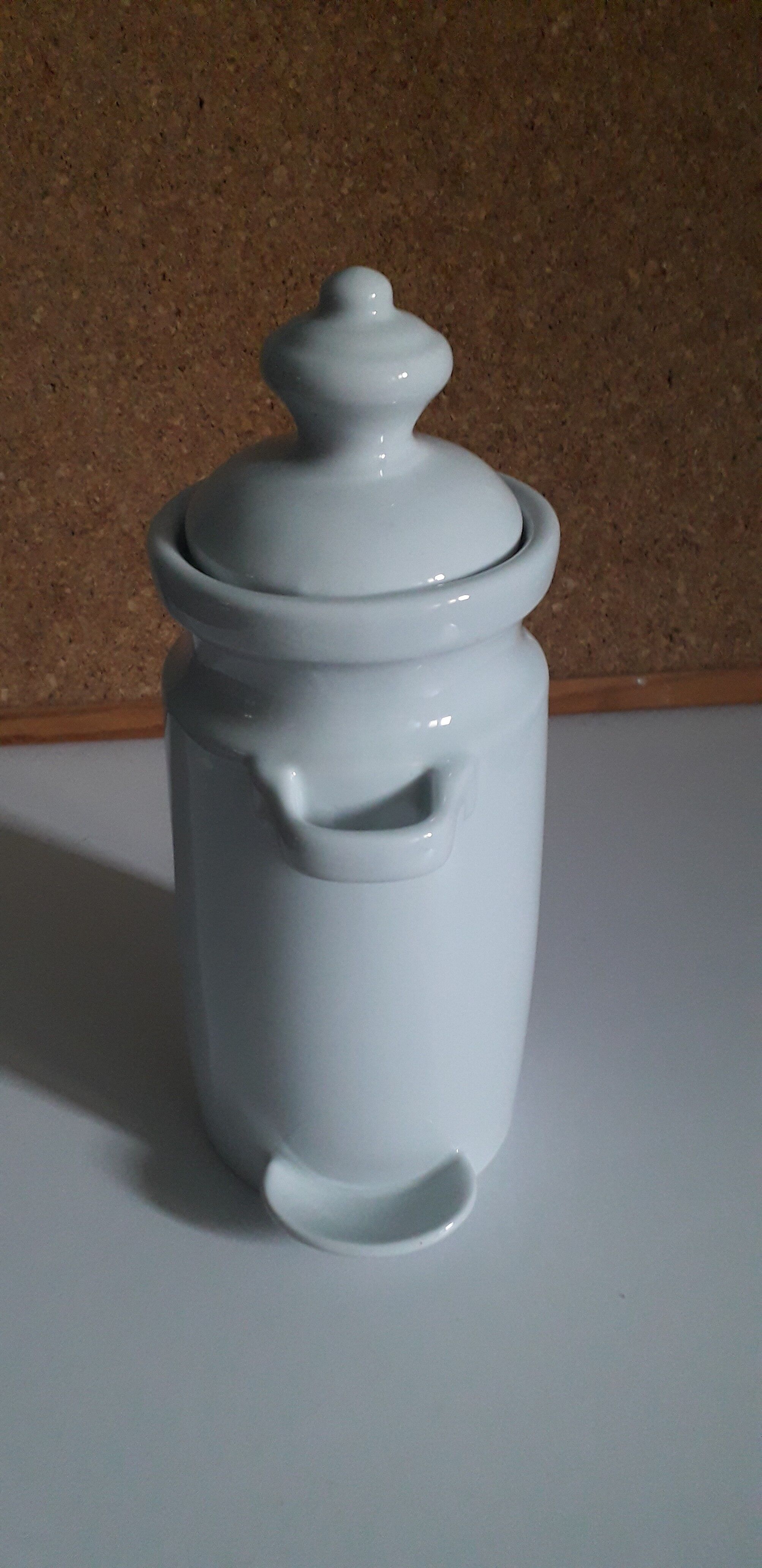 White porcelain pot for storing pickles or fruits with alcohol