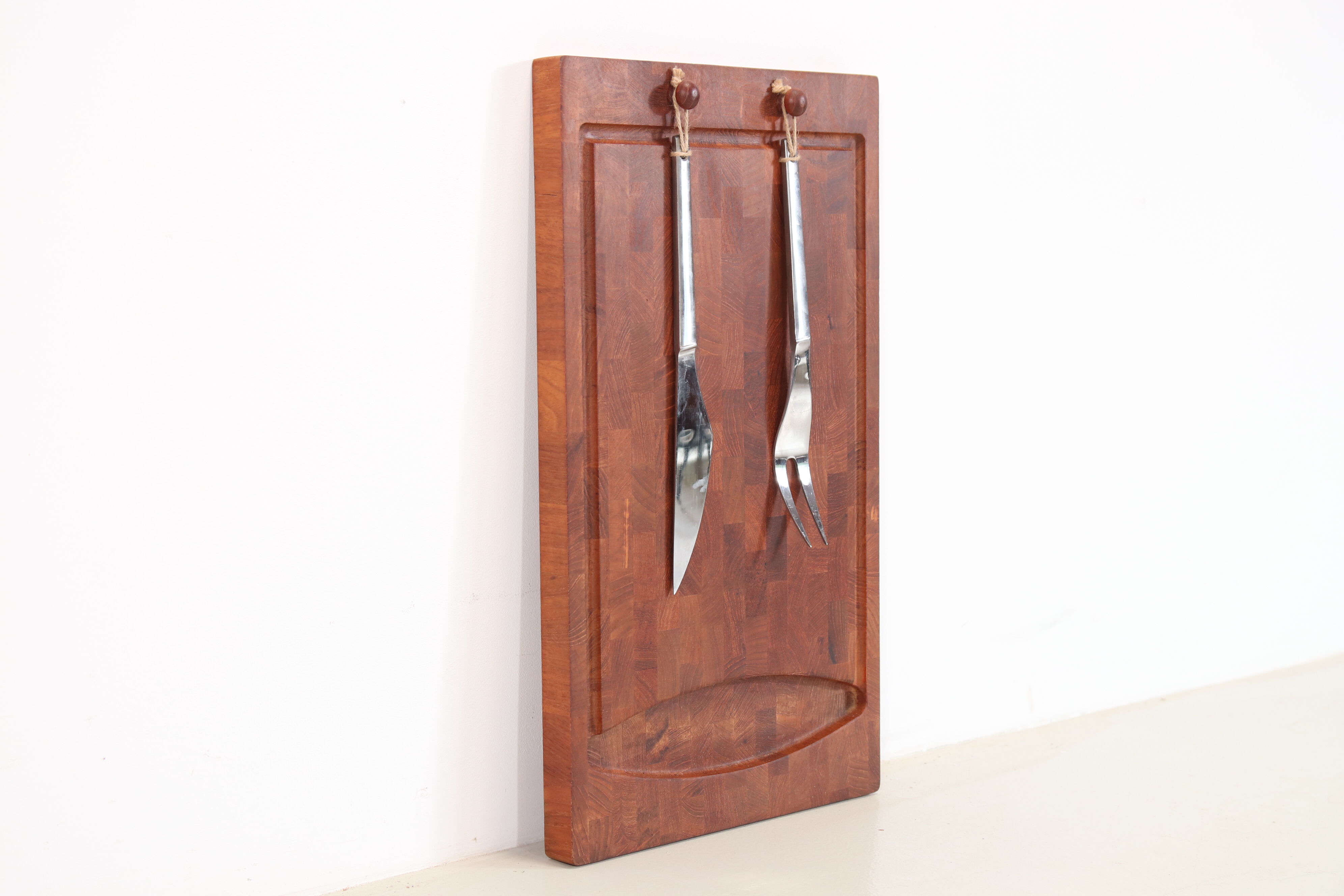 Danish cutting board and cutlery by Jens Quistgaard for Digsmed