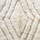 White handmade wool rug