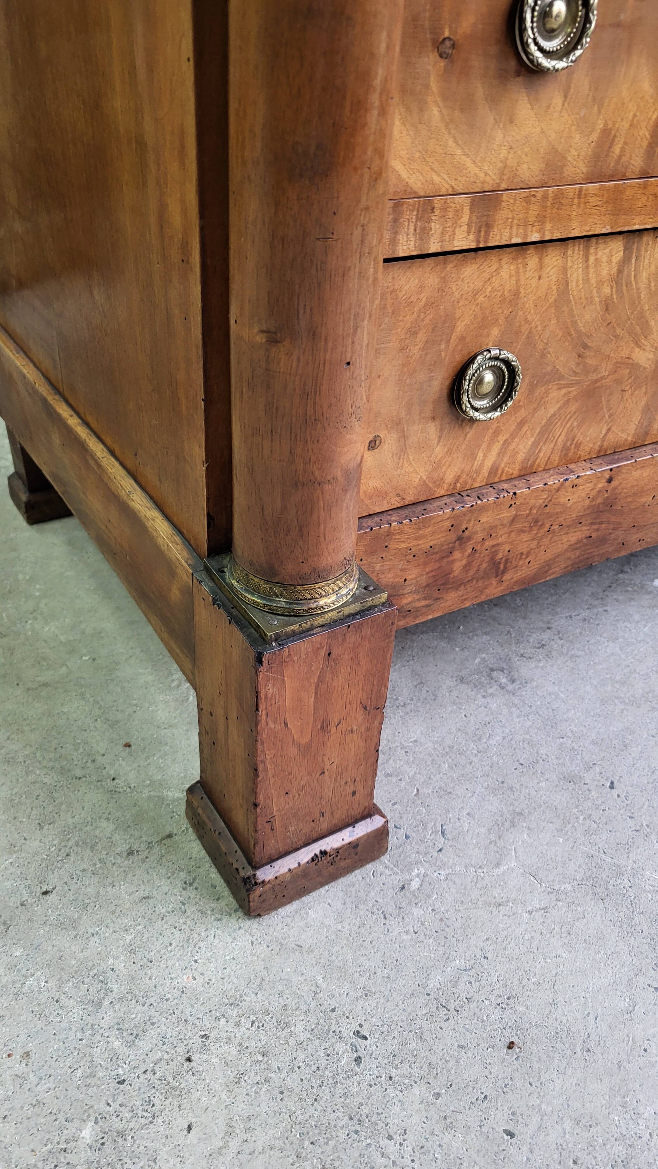 Empire commode in walnut with white marble top from the 19th century