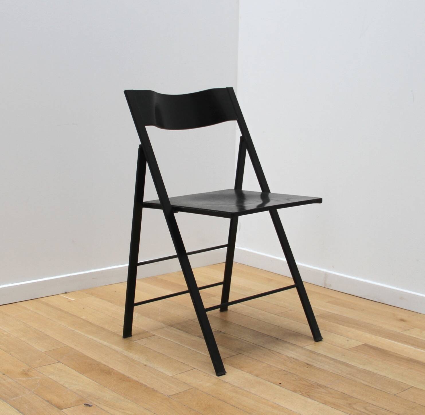 Suite of 12 folding designer chairs