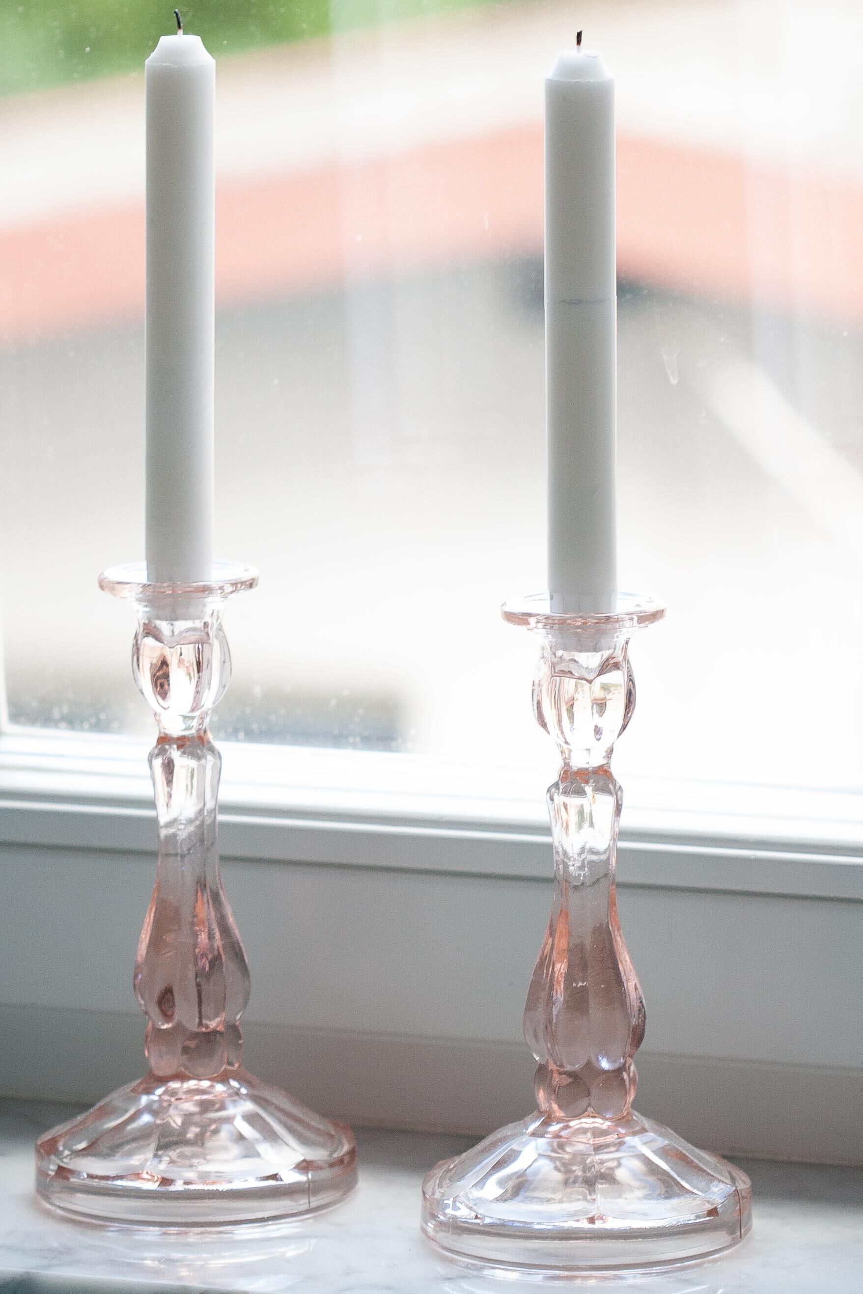 Set of two light pink glass candlesticks from the mid-century, Poland, 1960s.