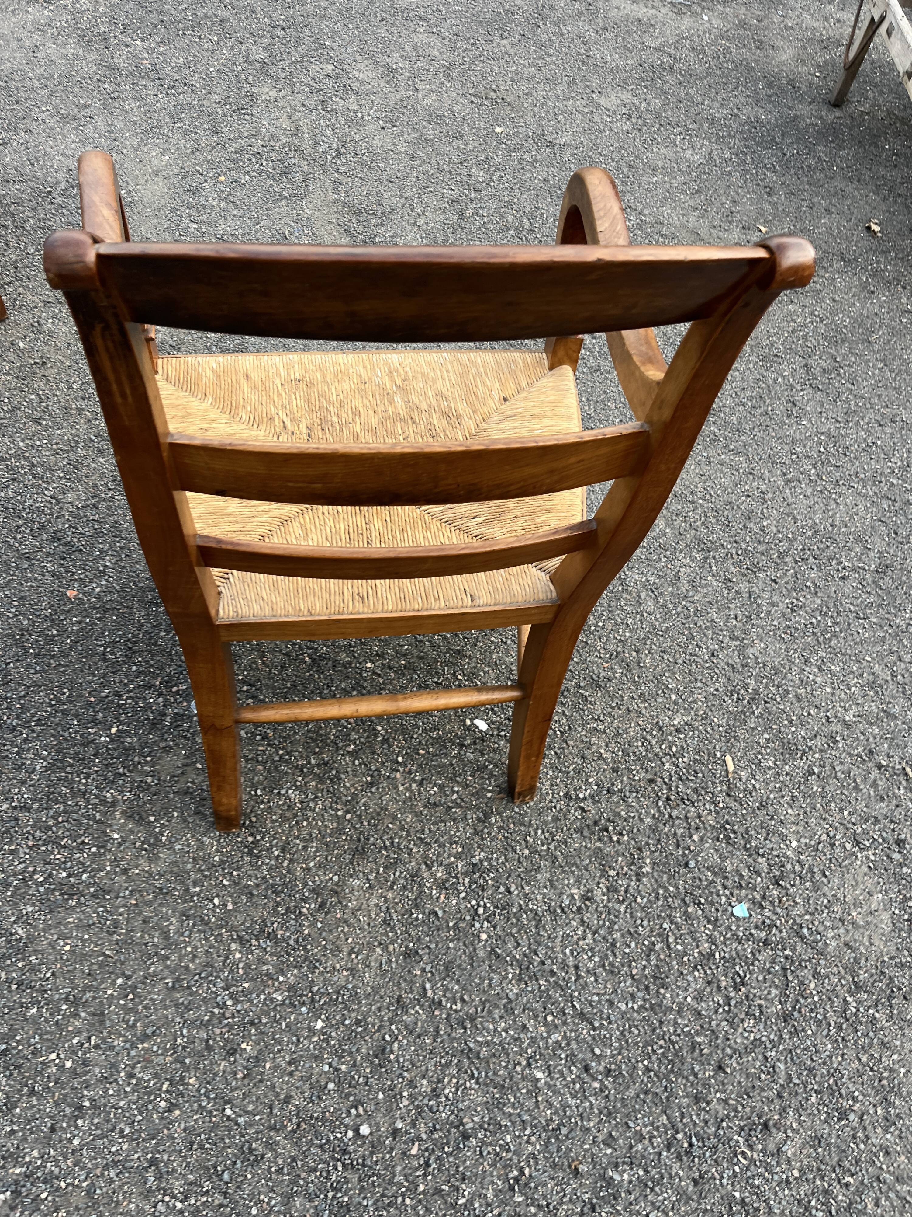 Louis Philippe country armchair in solid wood and straw, hooked armrests