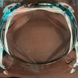 Ashtray paved in blue glass