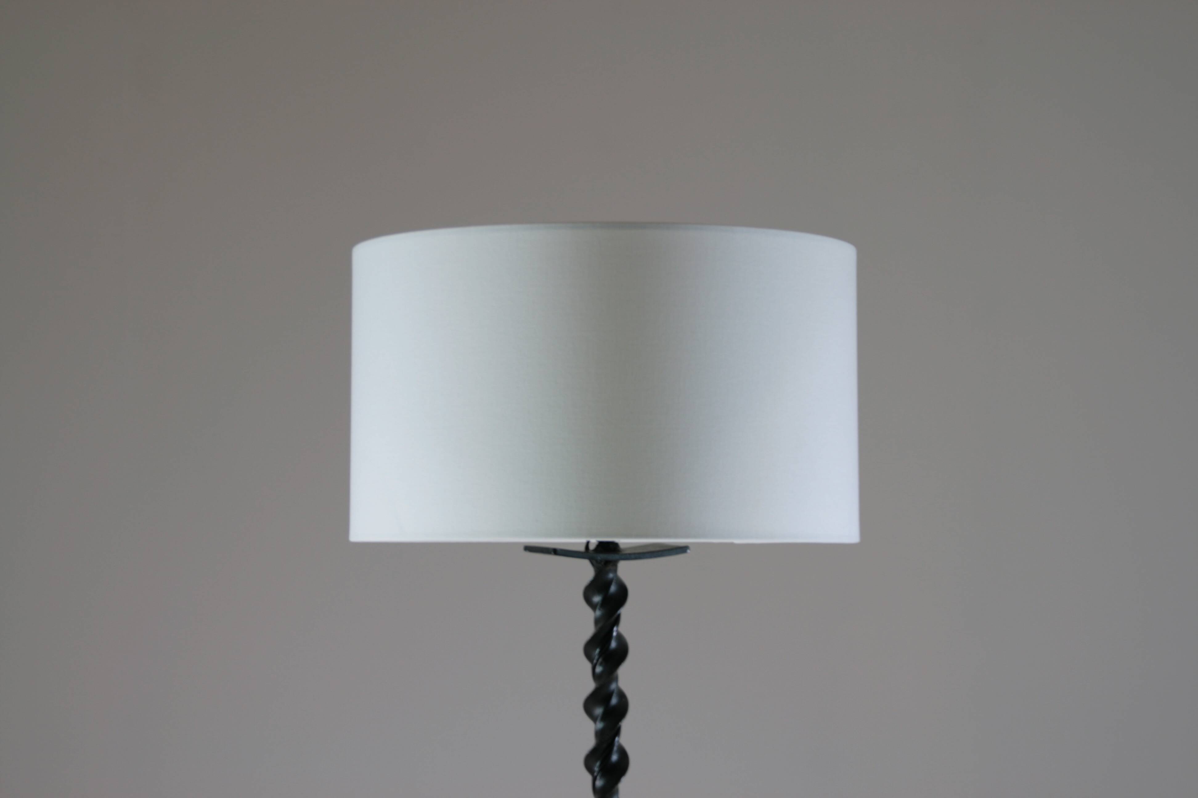 Twisted black metal brutalist floor lamp
