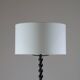 Twisted black metal brutalist floor lamp