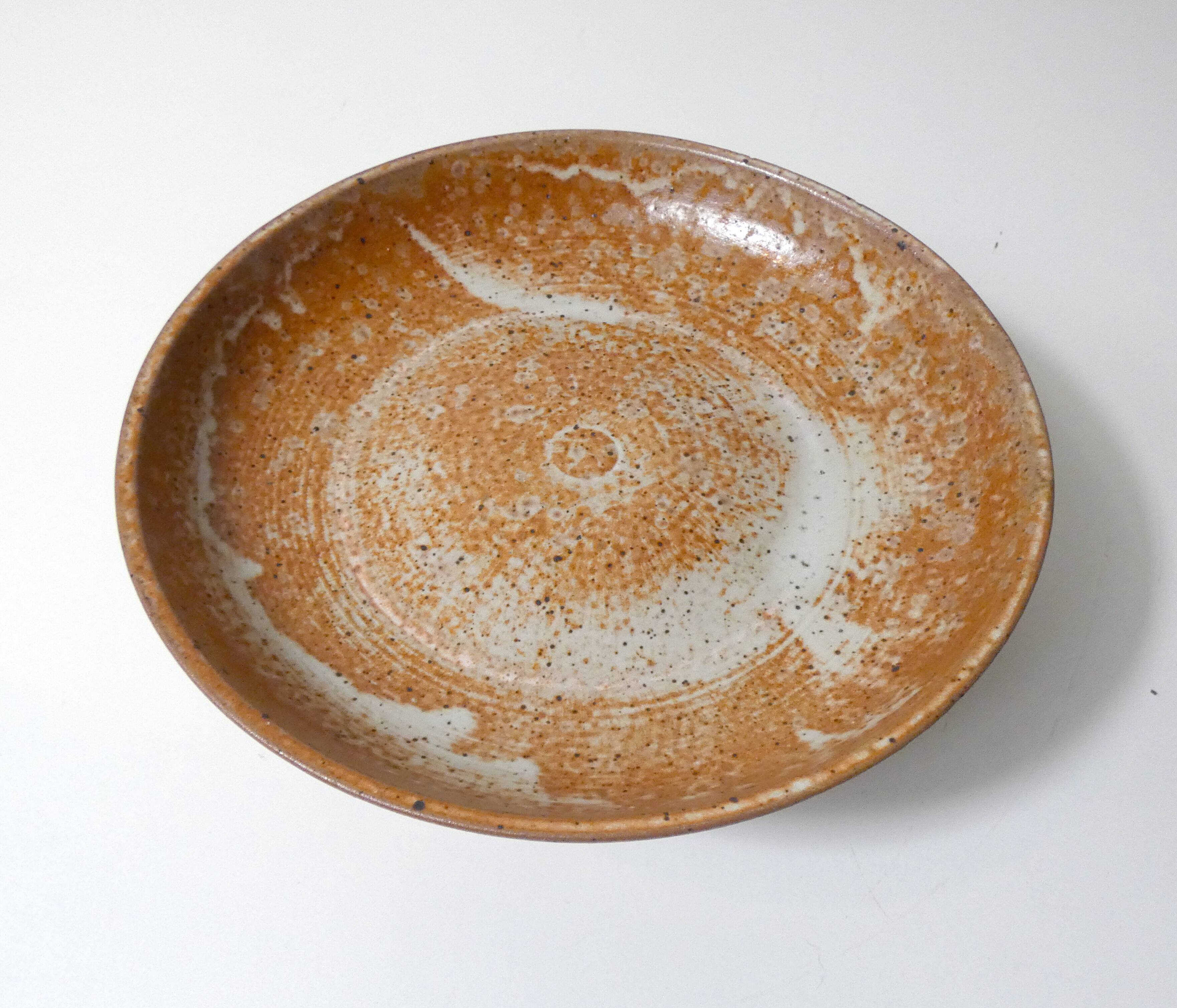 Large vintage stoneware compote dish with a footed plate