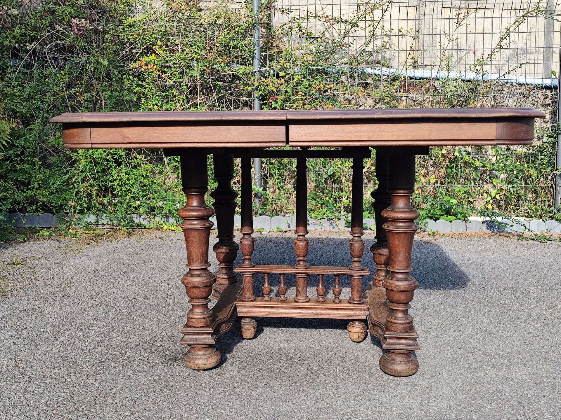 Square wooden table in Henri II style.
