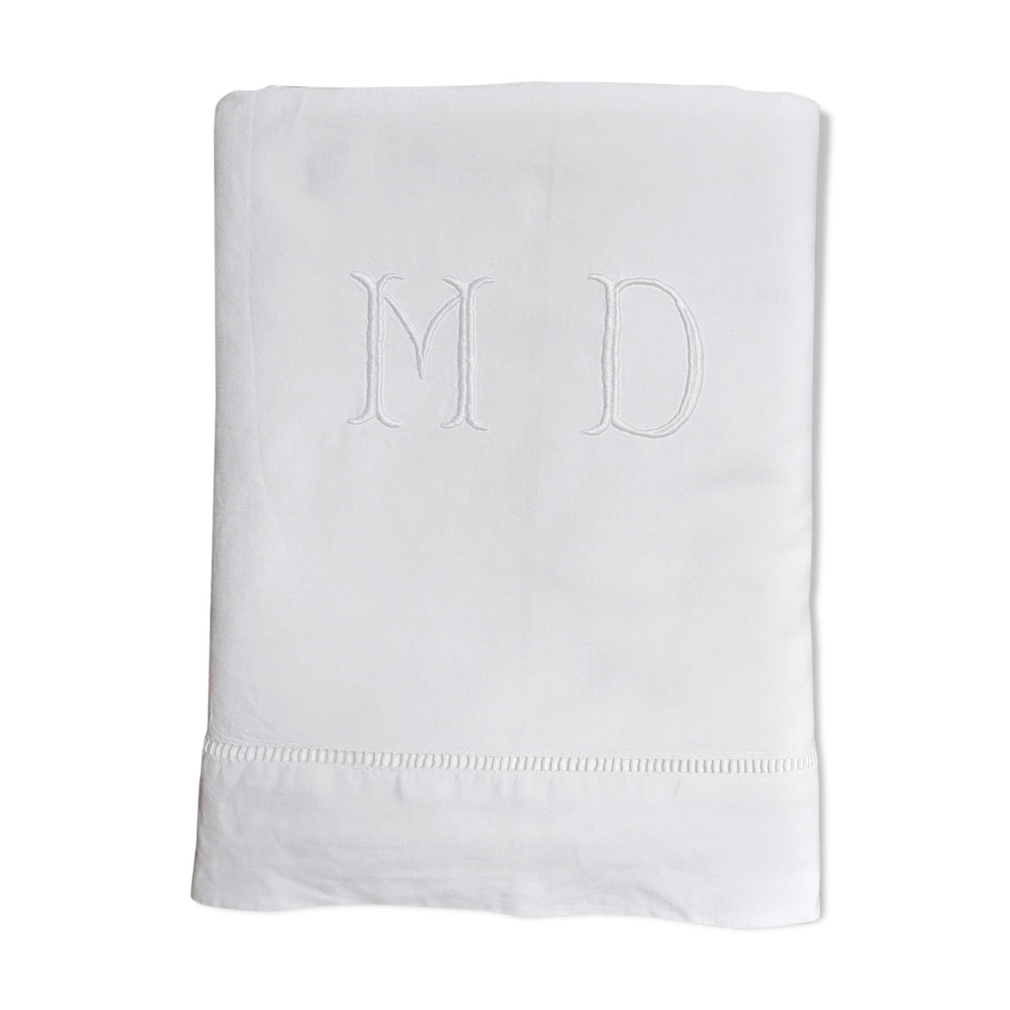 M and D monogram embroidered sheet