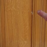 Old communication door with wood effect paint