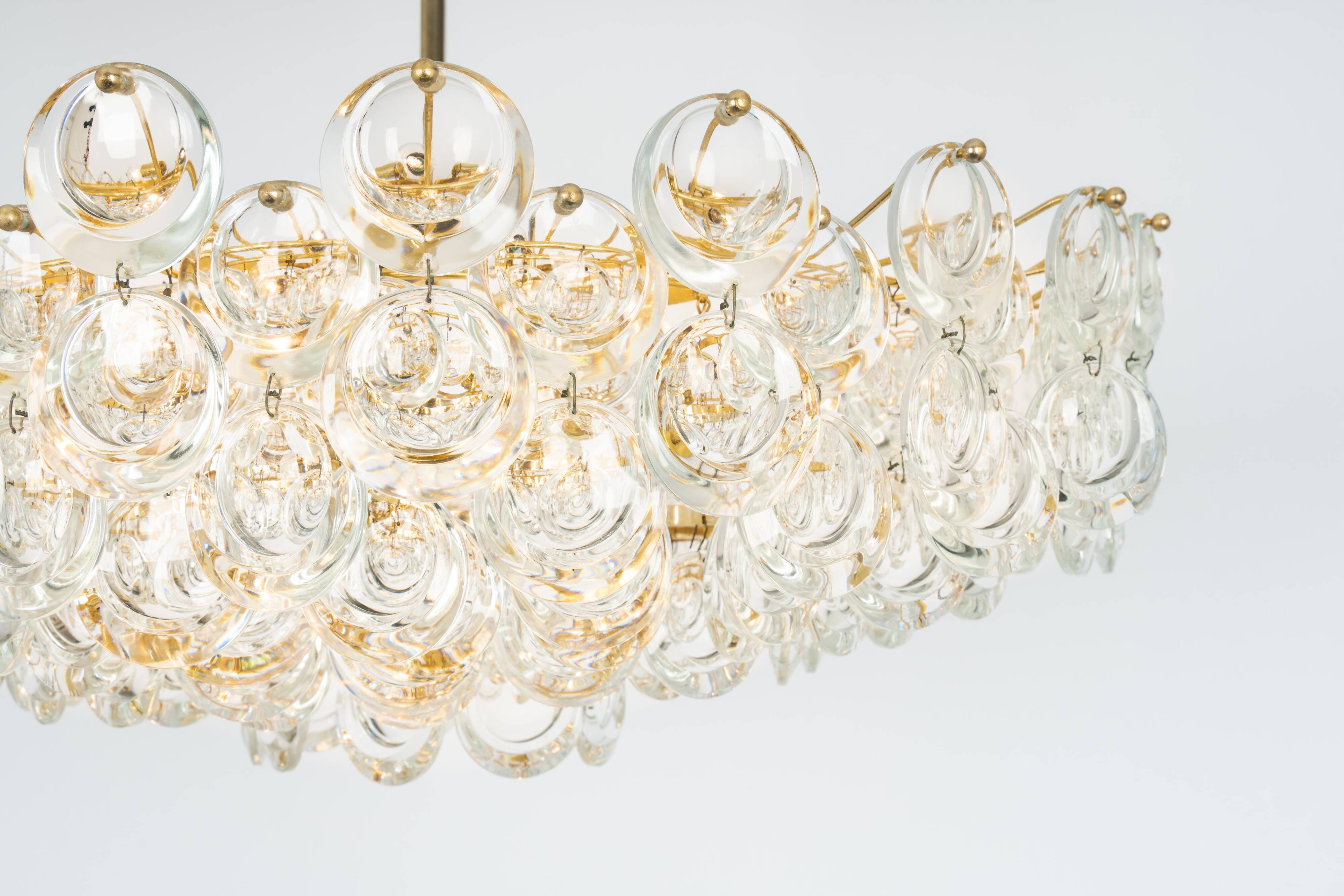 Large chandelier in gilded brass and crystal, Sciolari design by Palwa, Germany, 1970s.