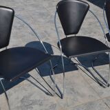 4 chrome and leather chairs designed by Italy