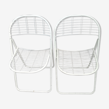 Duo of white metal folding chairs