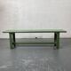Green wooden bench