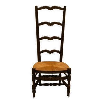 Old Provençal nurse's chair with mulched seat