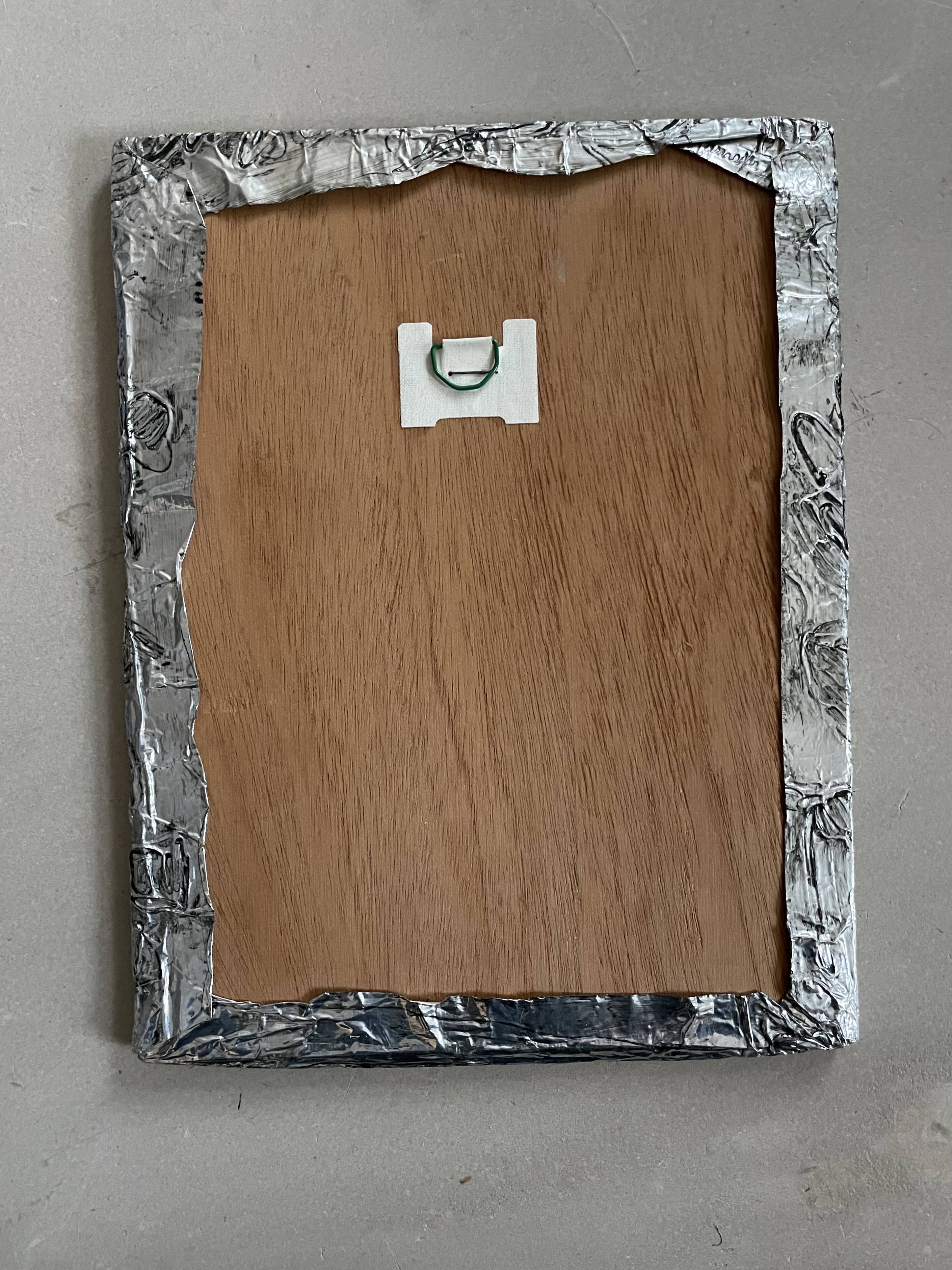 Vintage stamped mirror