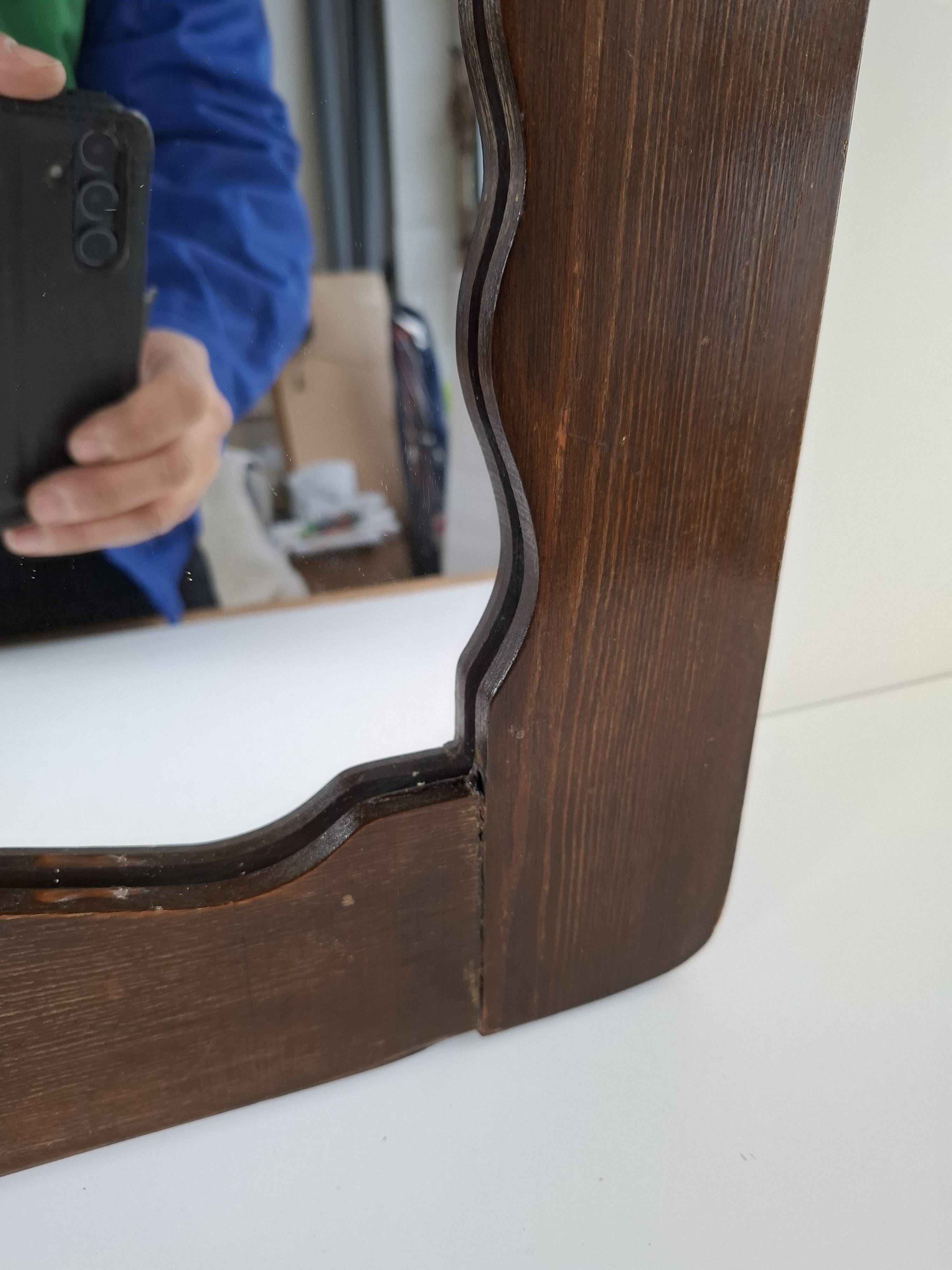 Czechoslovakian wall mirror with a wavy wooden frame, mid-century, 1940s