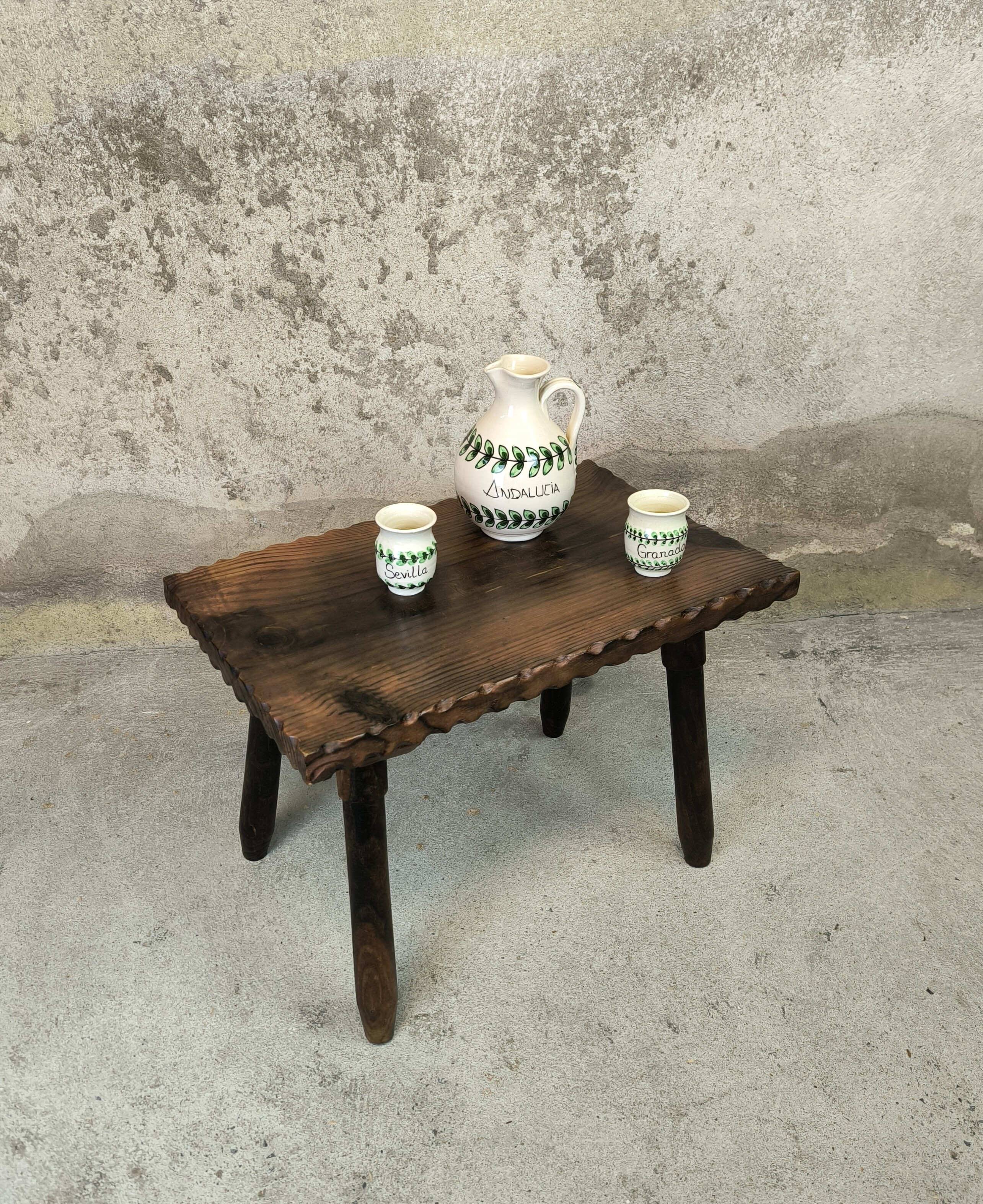 Small vintage coffee table made of solid wood.