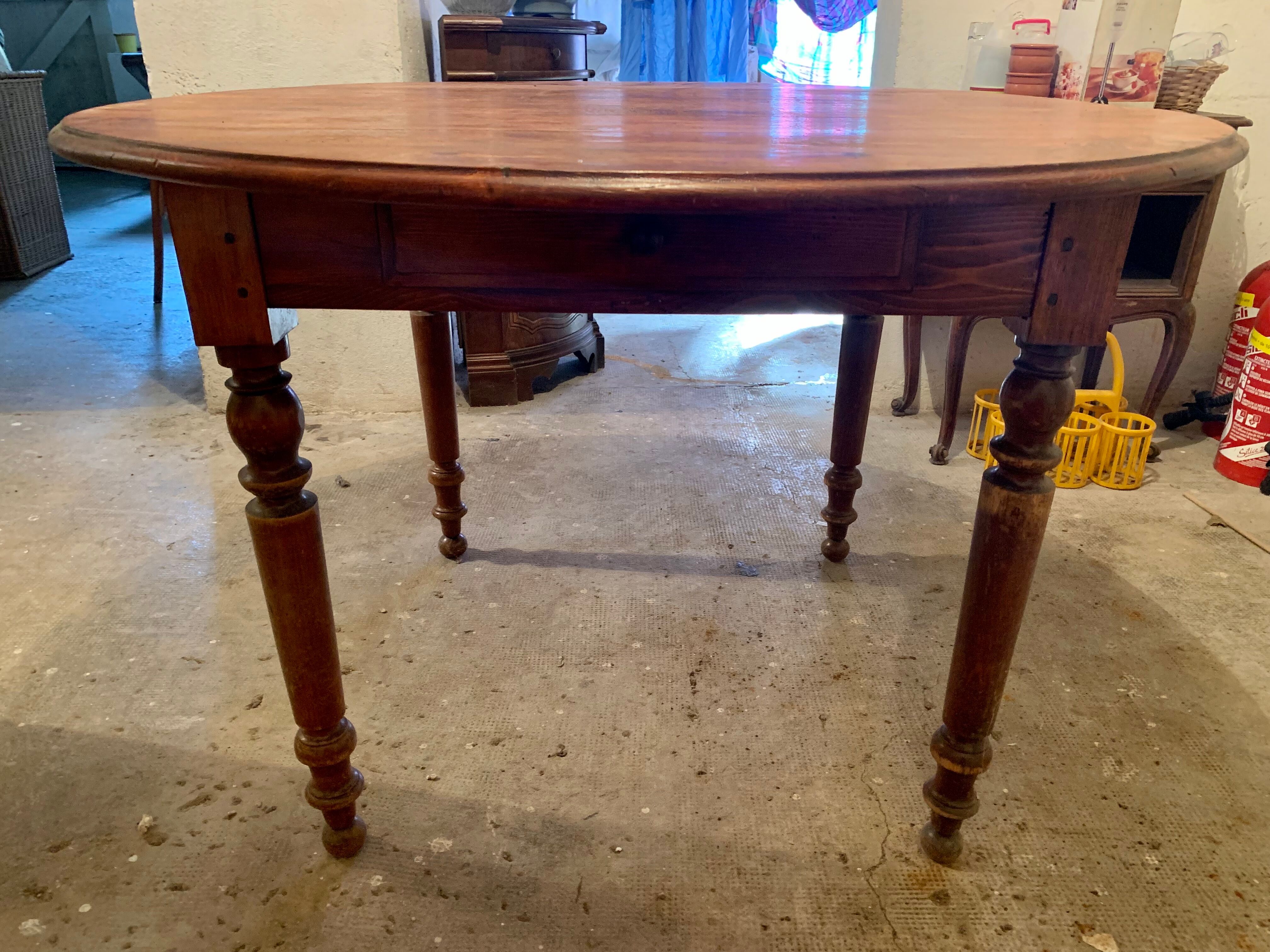 Ancient round table in pine