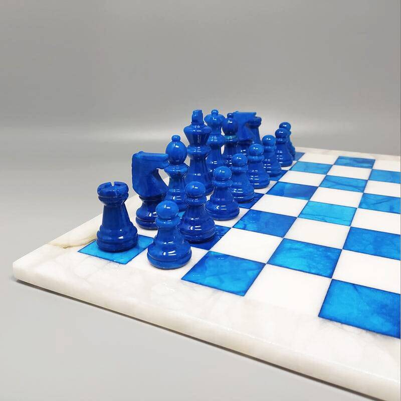 1970s gorgeous sky blue and white chess set in Volterra alabaster handmade. Made in Italy