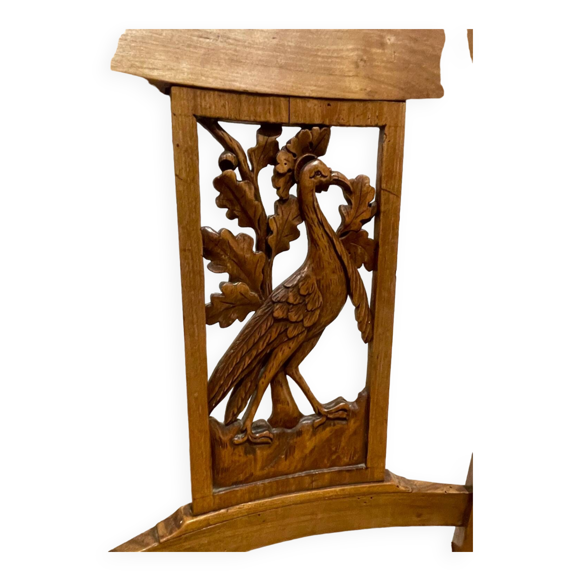 19th century straw chair with carved peacock back