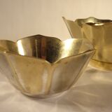 Two brass trundle cups