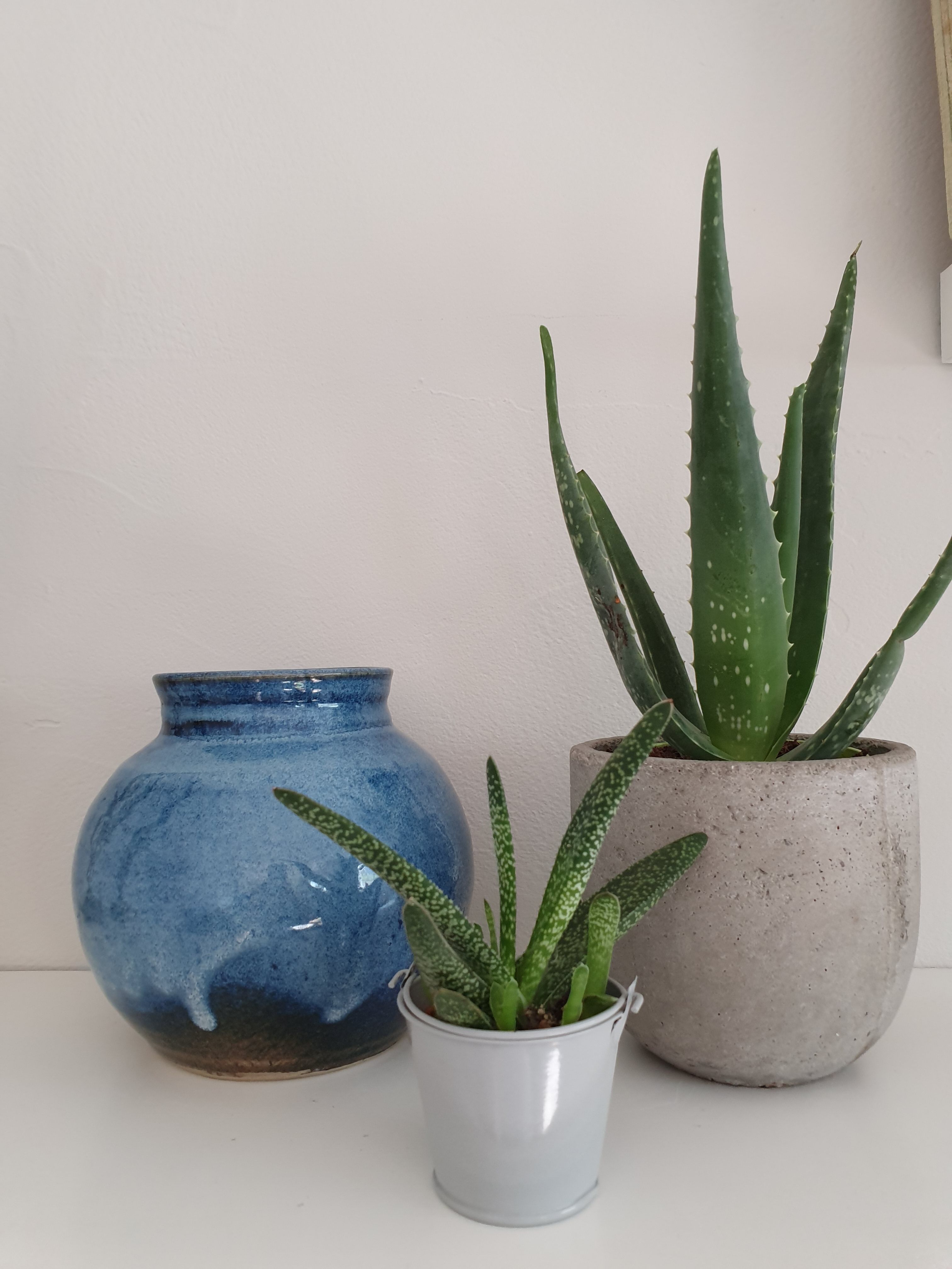 Enamelled sandstone ball vase