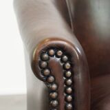 luxury dark leather club chair with English-style ball feet
