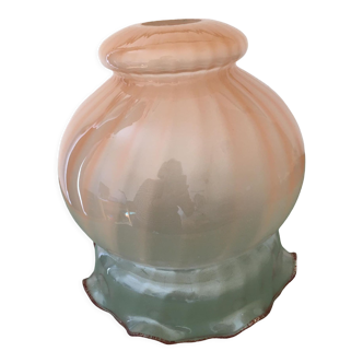 Globe with transparent peach colored glass rims