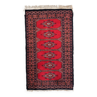 Tapis vintage ouzbek Boukhara fait main en laine – 62 x 106 cm – Années 1970
