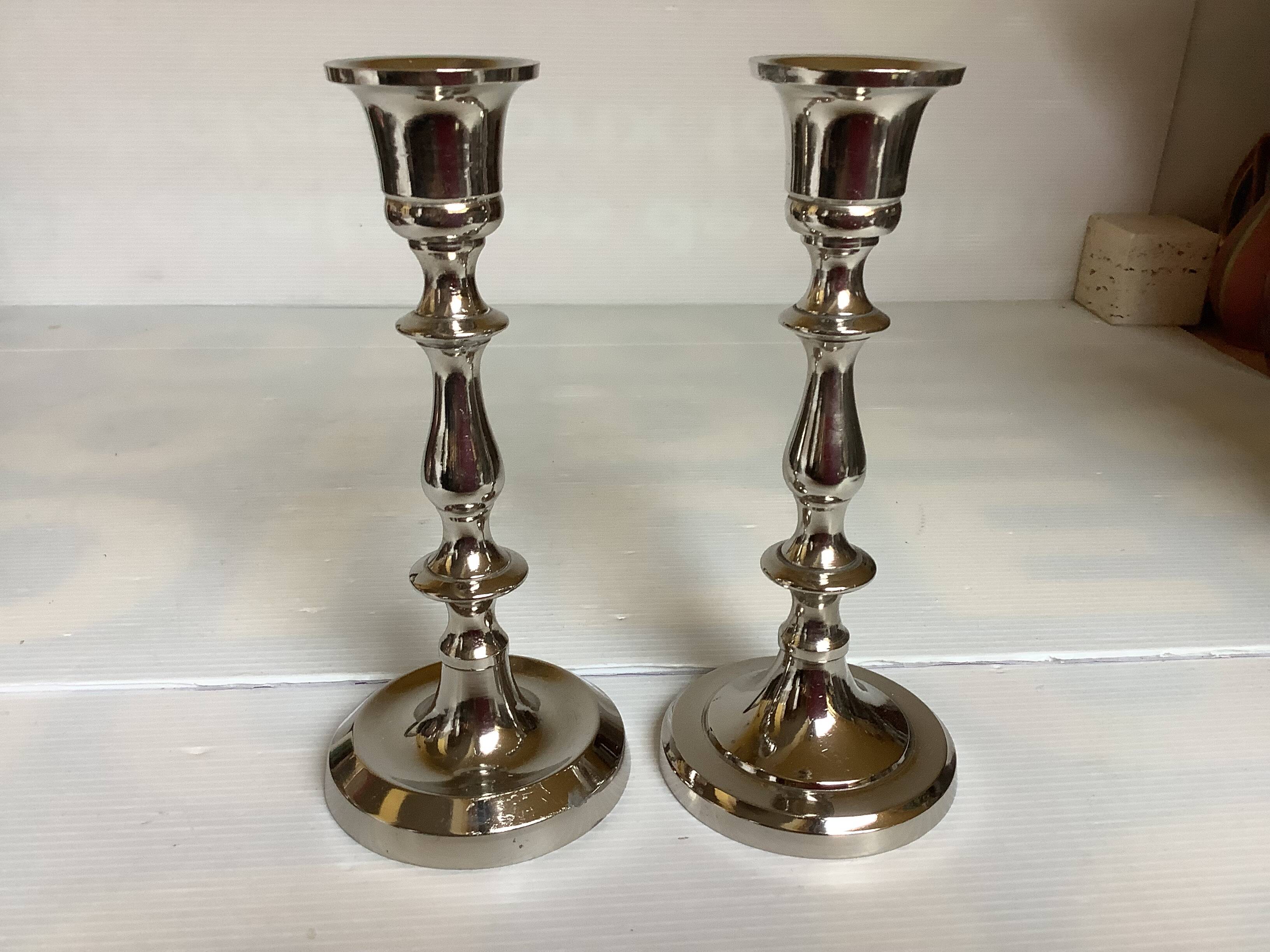 Pair of silver metal candlesticks