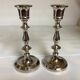 Pair of silver metal candlesticks