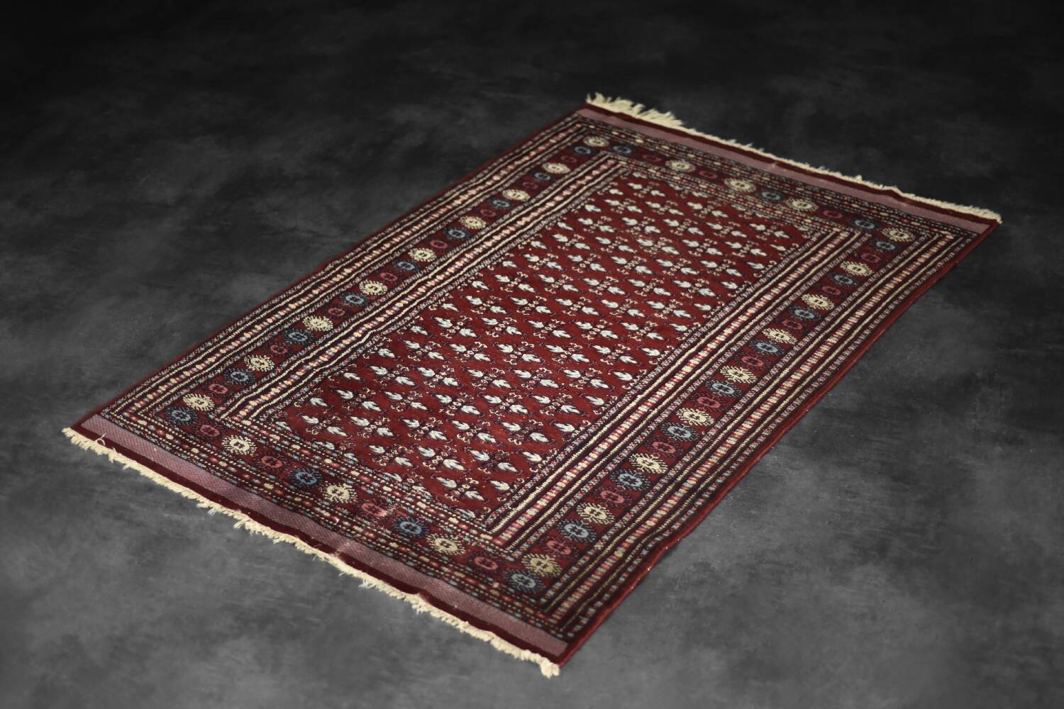 Handwoven red Boukhara oriental rug, 1960s