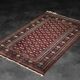 Handwoven red Boukhara oriental rug, 1960s