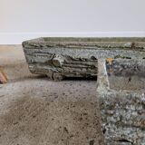 Old planters in faux cement wood